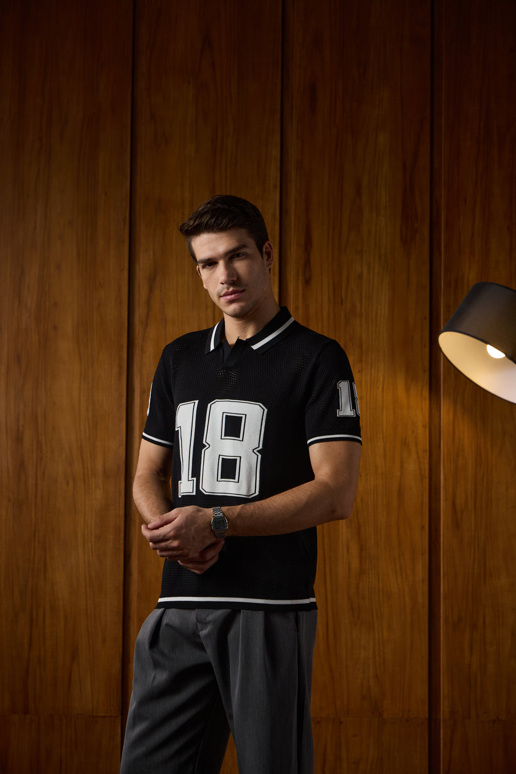 THE VARSITY MESH POLO IN DEEP BLACK