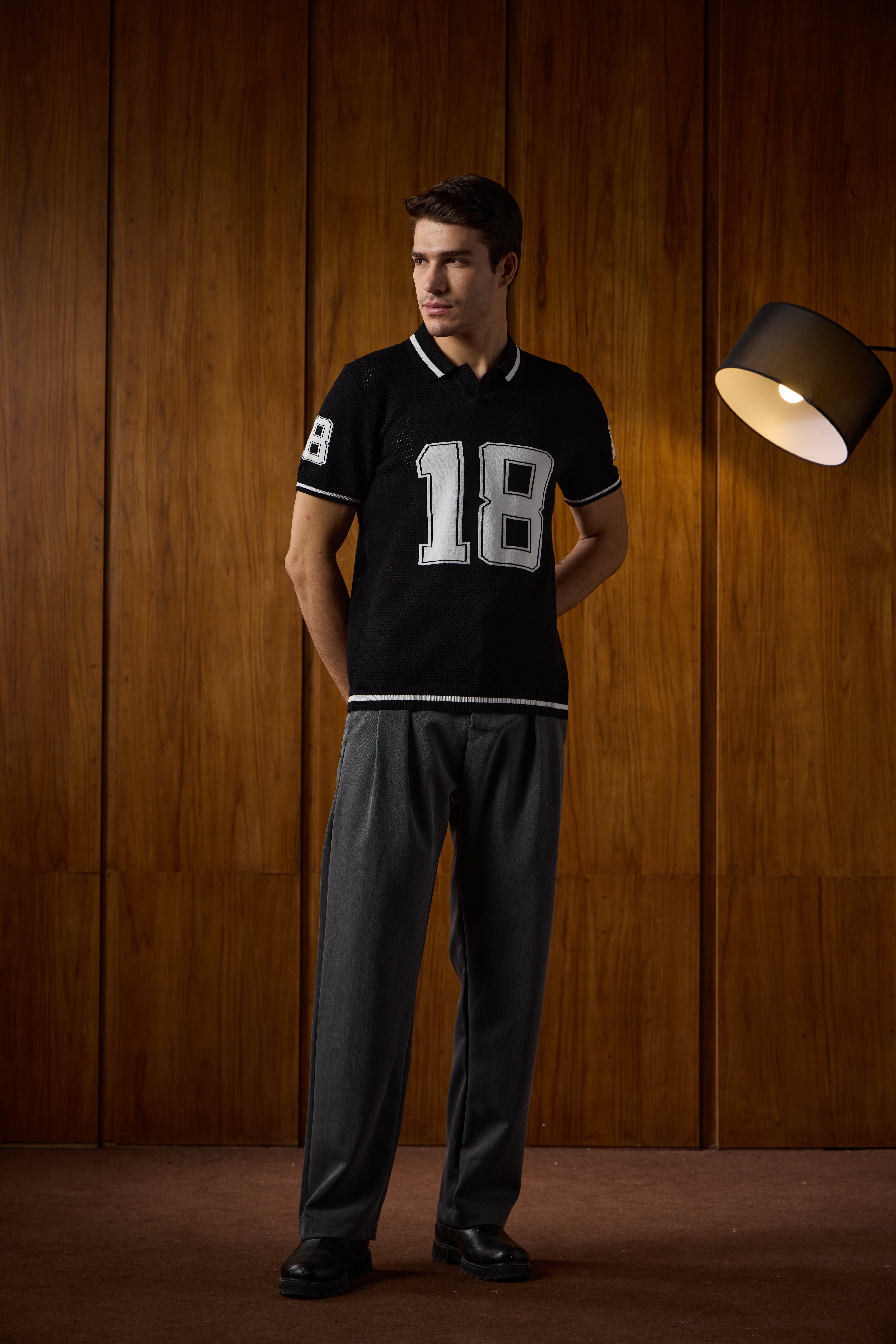 THE VARSITY MESH POLO IN DEEP BLACK