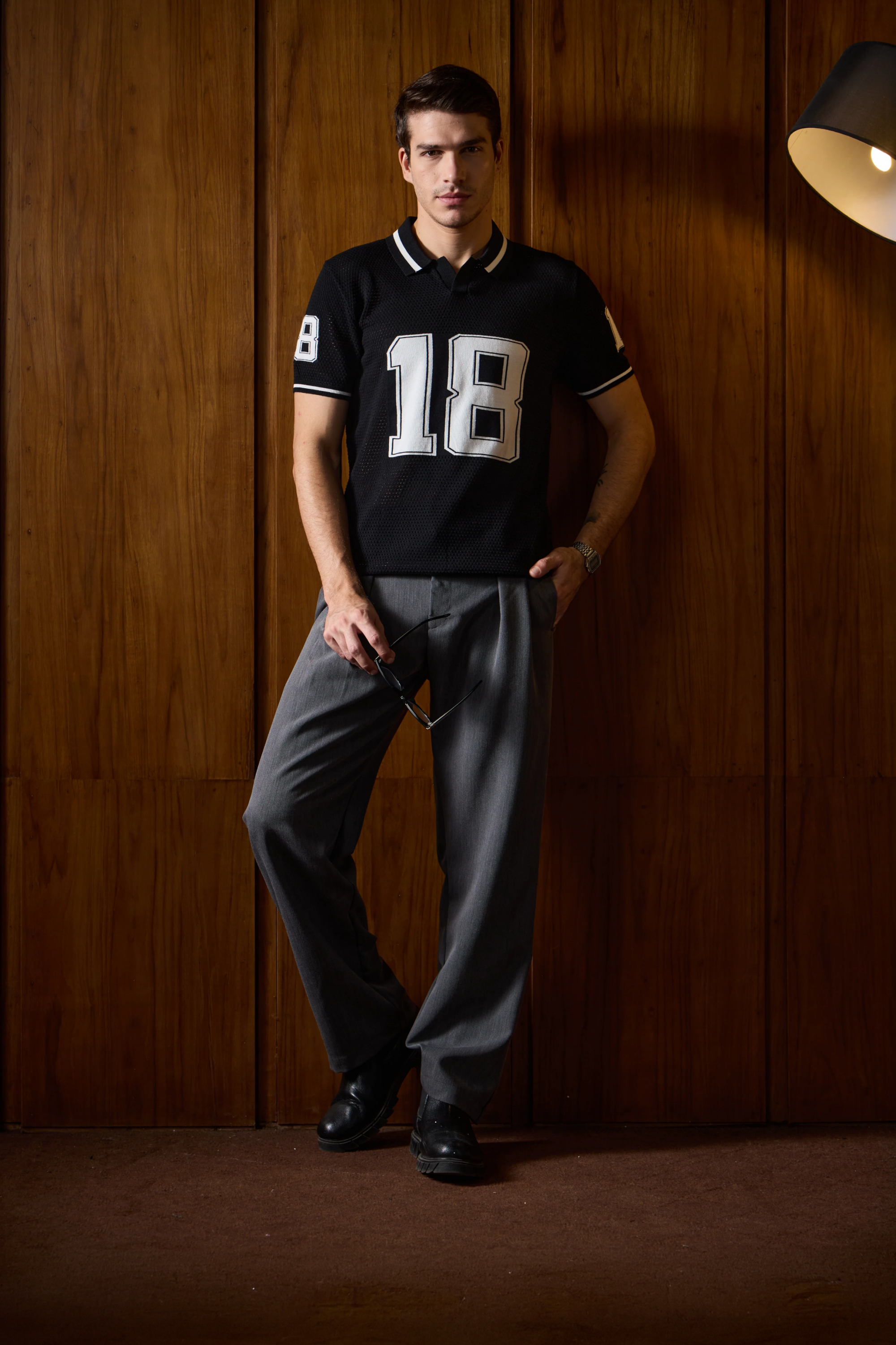 THE VARSITY MESH POLO IN DEEP BLACK