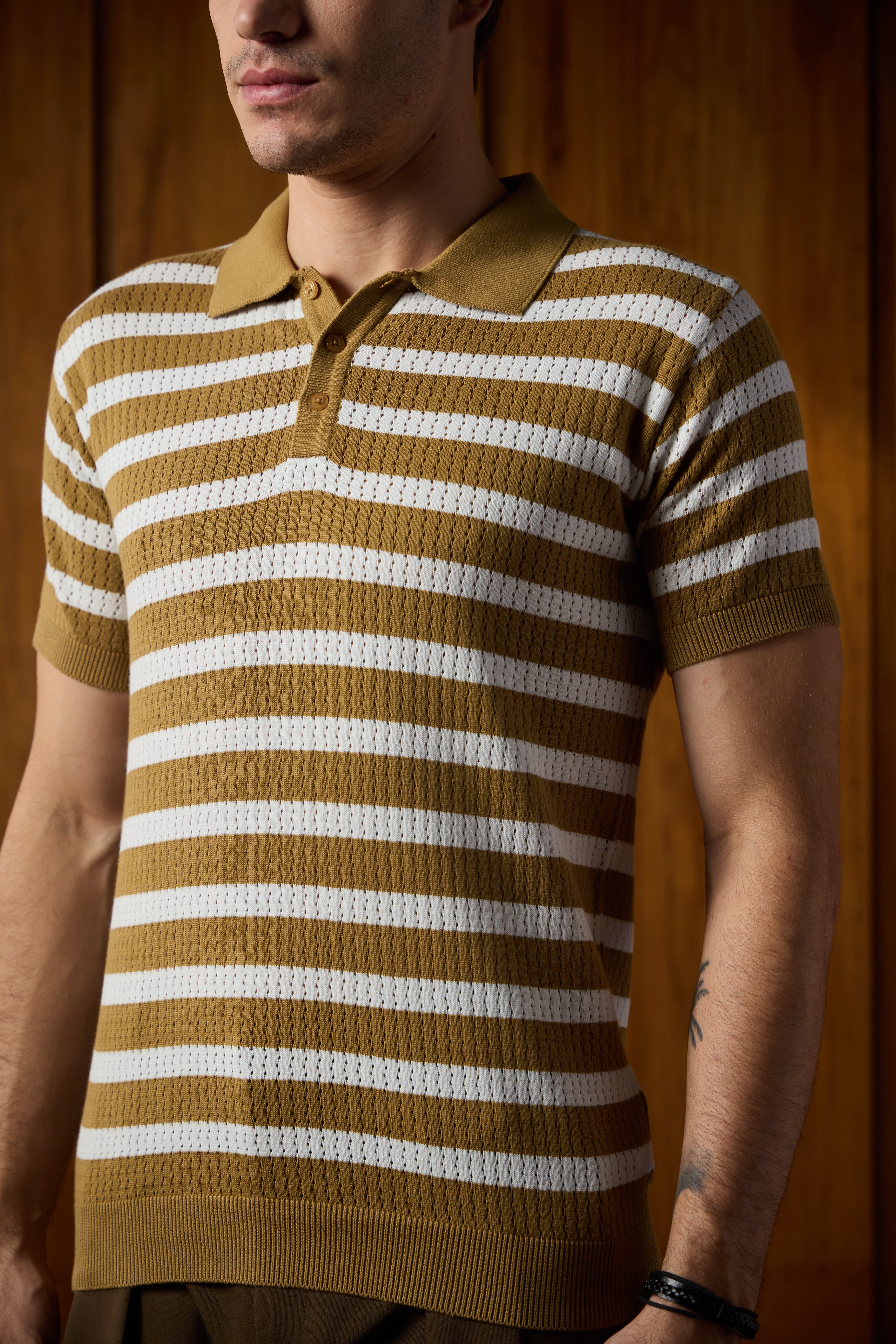 THE NAUTICA STRIPED POLO IN BRONZE