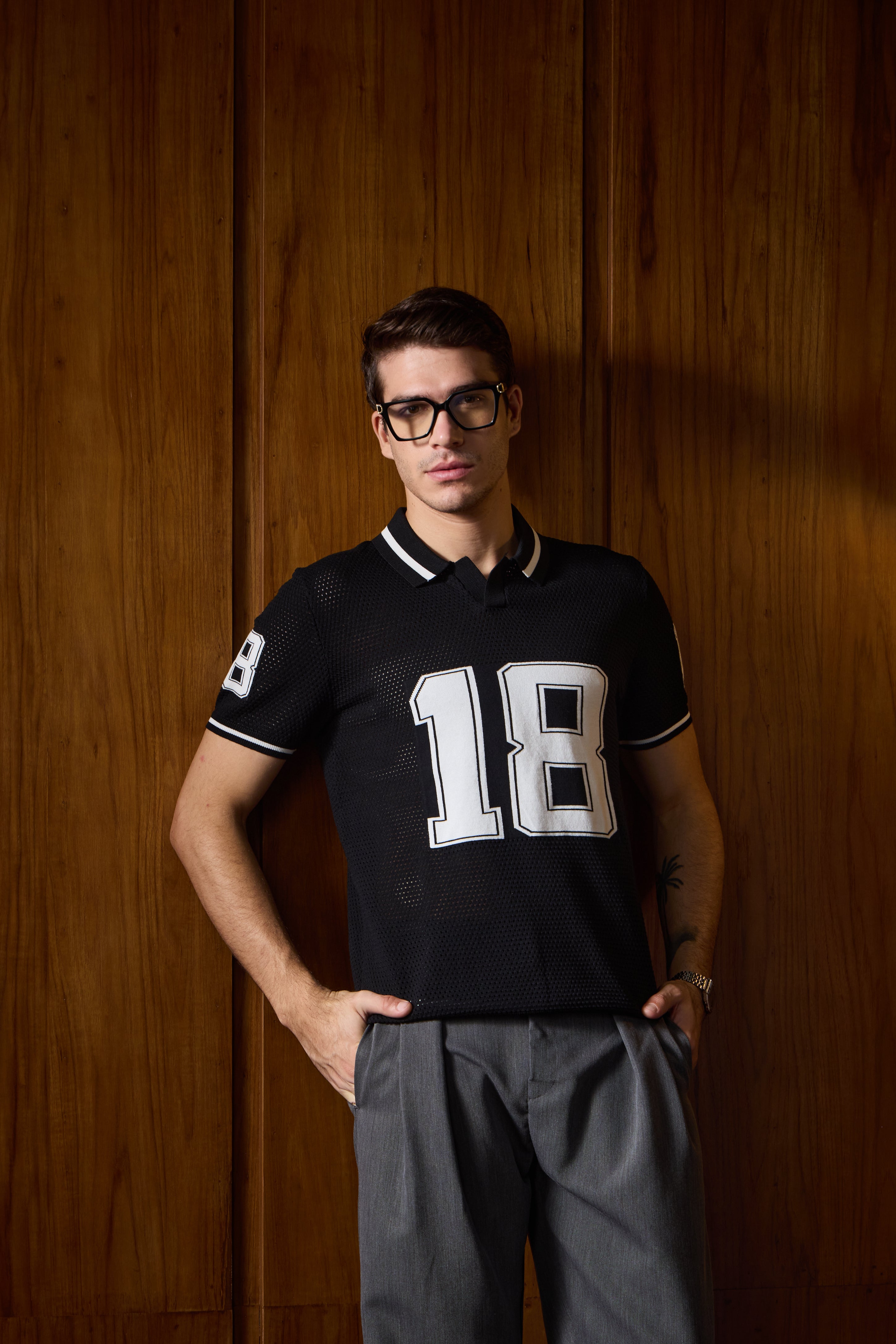 THE VARSITY MESH POLO IN DEEP BLACK