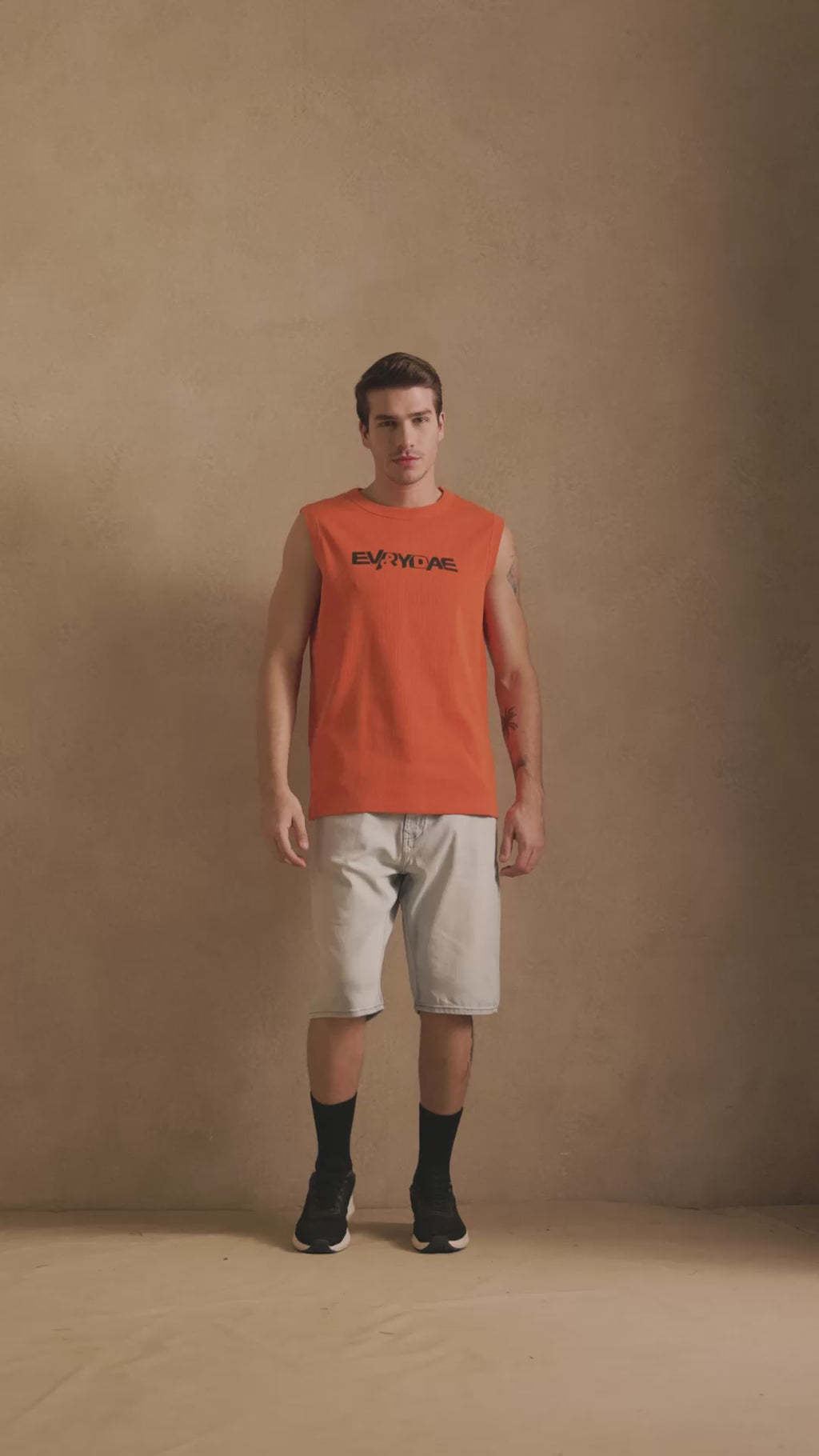 RIBBED MUSCLE TANK IN AMBER ORANGE