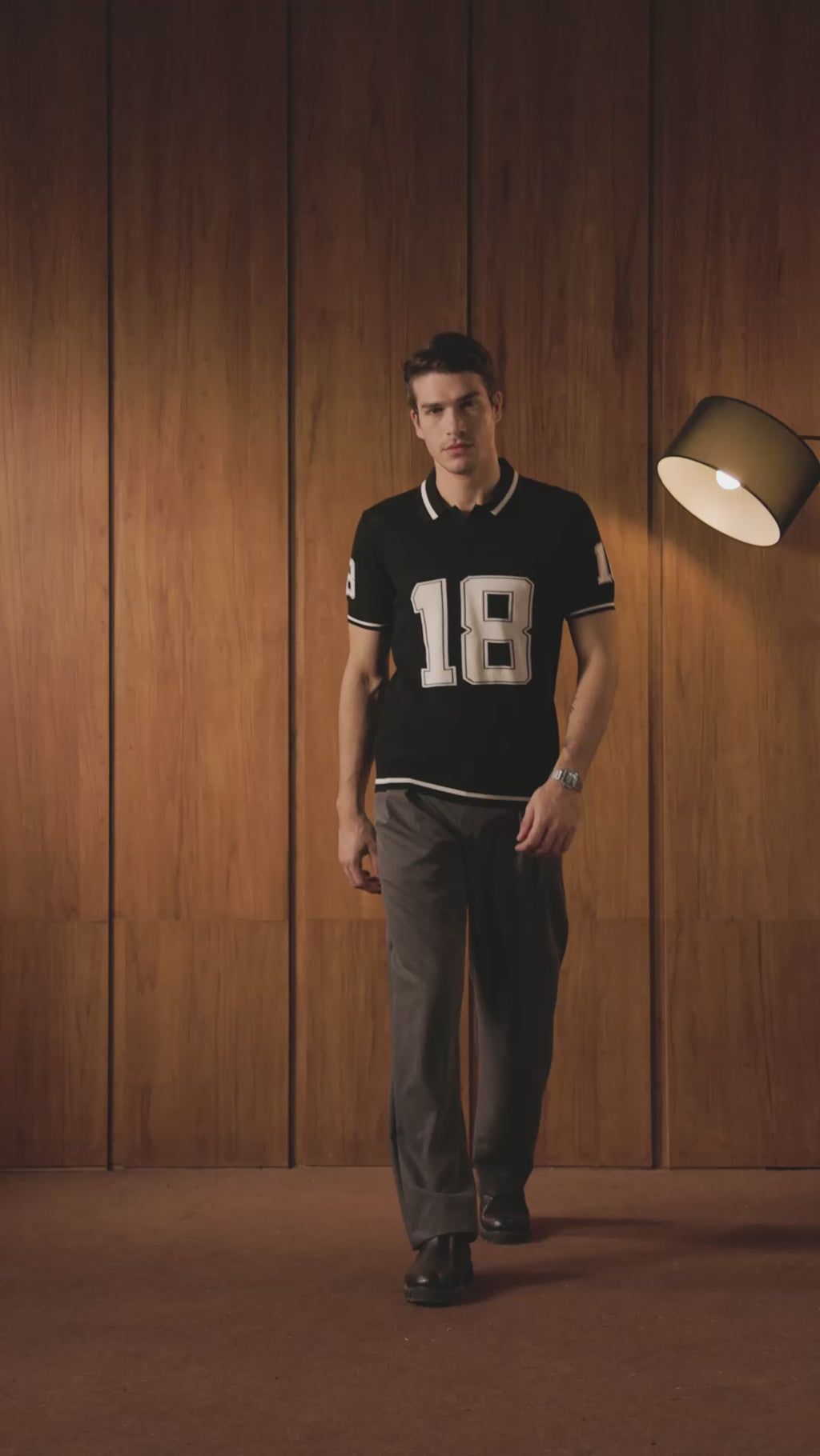 THE VARSITY MESH POLO IN DEEP BLACK